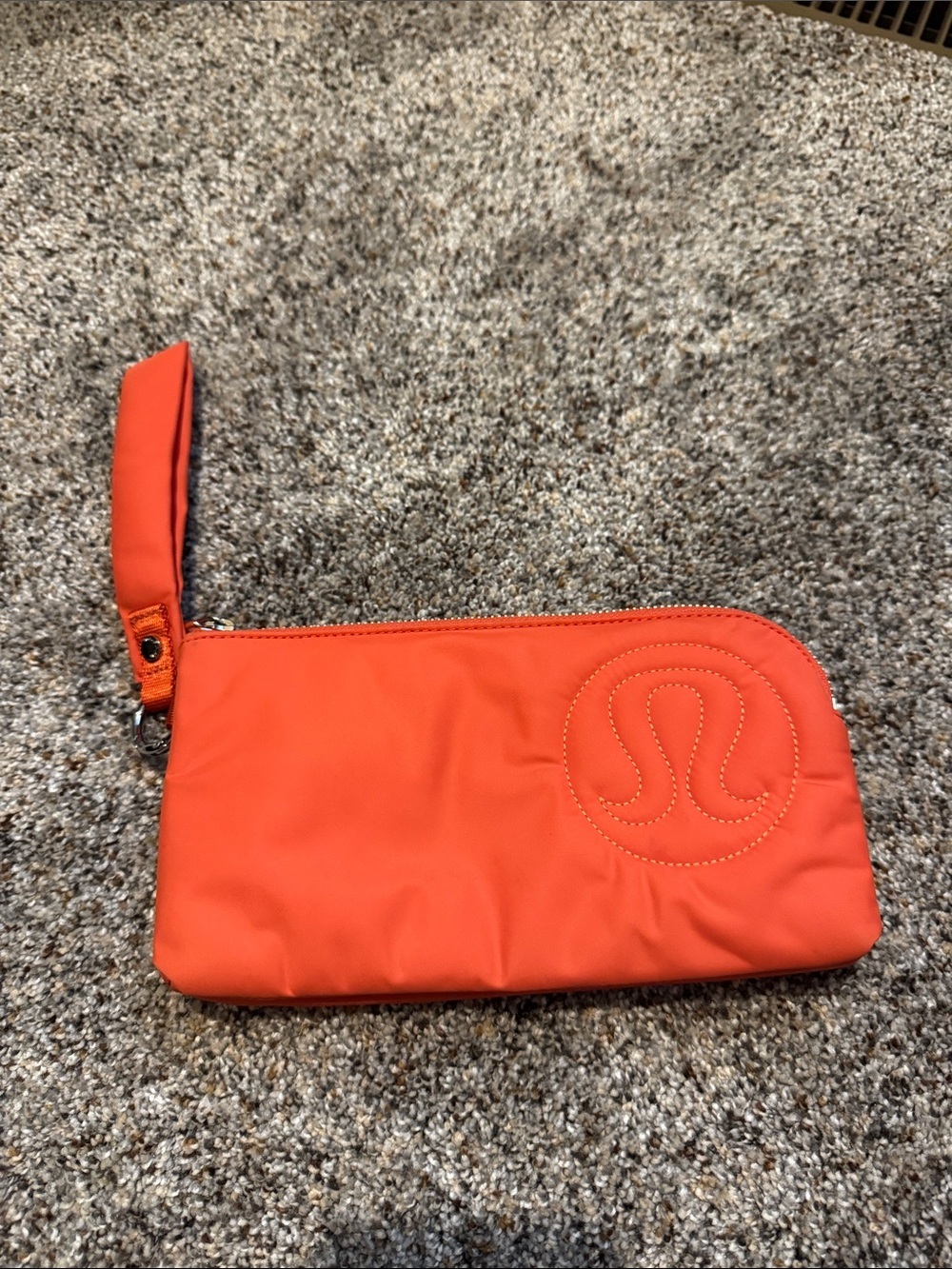 lululemon athletica puffy Orange Logo Wristlet